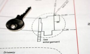 Property survey showing a building layout, dimensions, and boundary lines for a mortgage survey