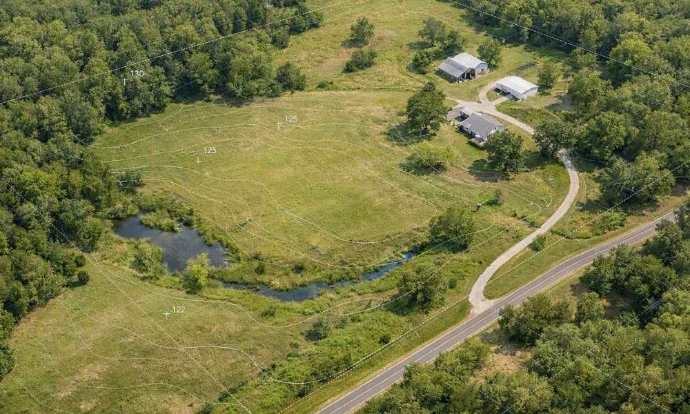Drone mapping property planning louisiana - ALTA SURVEY Louisiana Aerial drone mapping view of a Louisiana property showing existing structures, access roads, drainage, and terrain contours